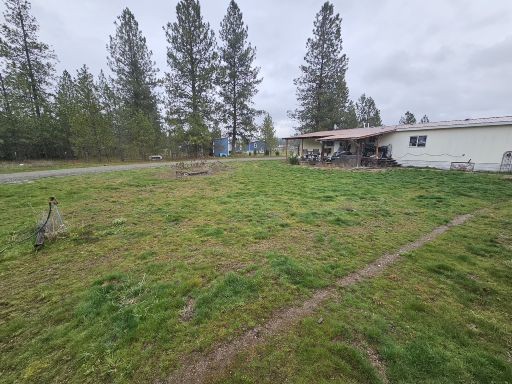 Before Complete Landscape & Irrigation Overhaul in Chattaroy, WA