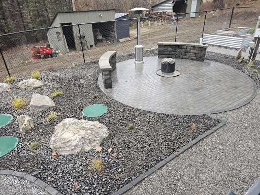 After Backyard Grade Change, Patio & Retaining Wall Transformation in Elk, WA
