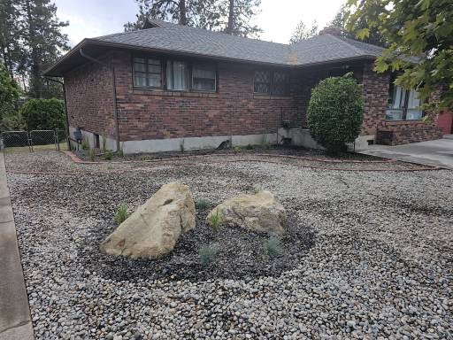 After Full Landscape Refresh with Irrigation, Concrete Patio & Rock Install in Spokane, WA