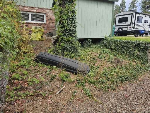 Before Weed Cleanup & Chipped Basalt Rock Installation in Spokane, WA